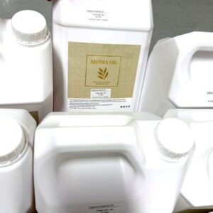 Close-up of 5L white plastic container for Scentvita industrial essential oil with product label.